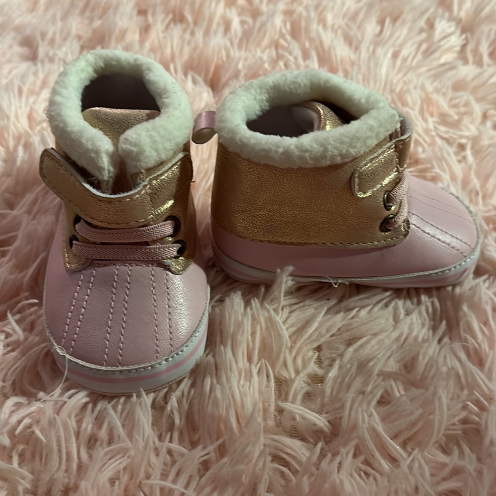 Newborn-ish boots. Never worn.